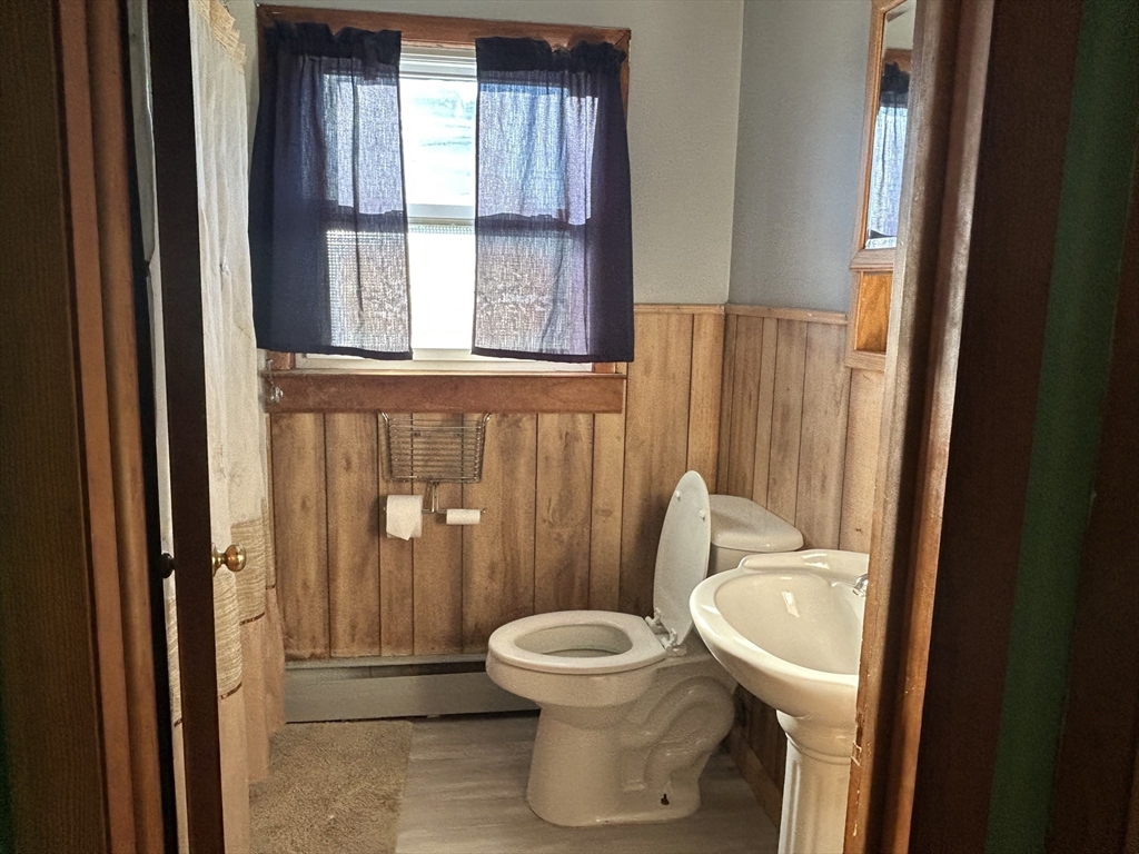 286 Westfield Road Holyoke, MA 01040 - Photo 14 of 26 a bathroom with a toilet and a sink