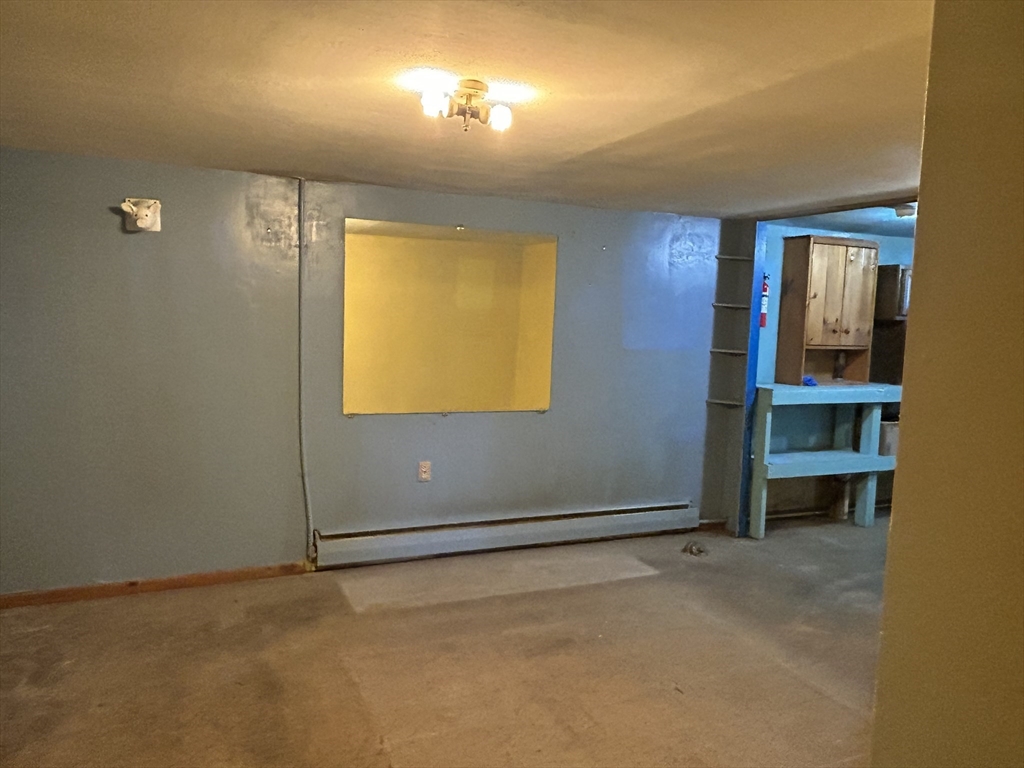 286 Westfield Road Holyoke, MA 01040 - Photo 22 of 26 an empty room with windows