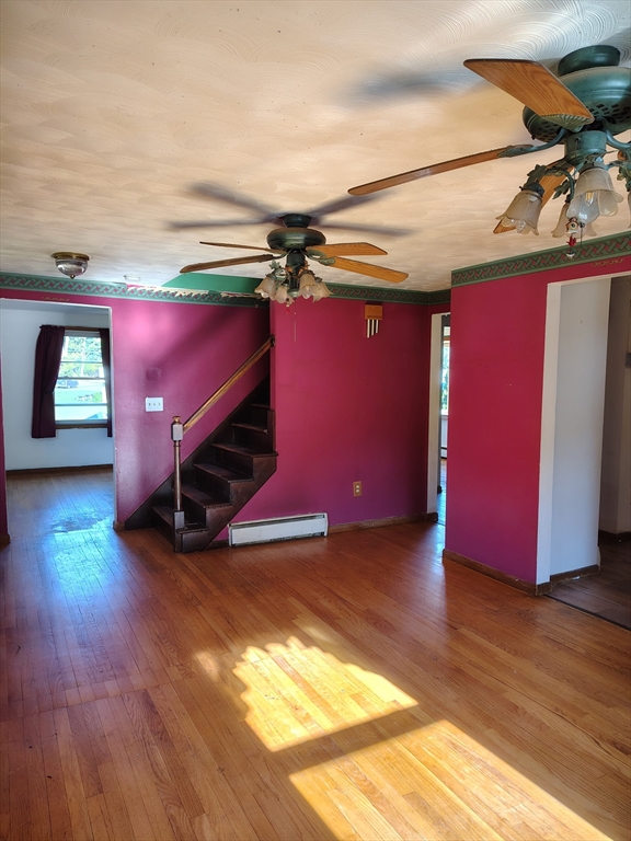 286 Westfield Road Holyoke, MA 01040 - Photo 5 of 26 a view of empty room with wooden floor