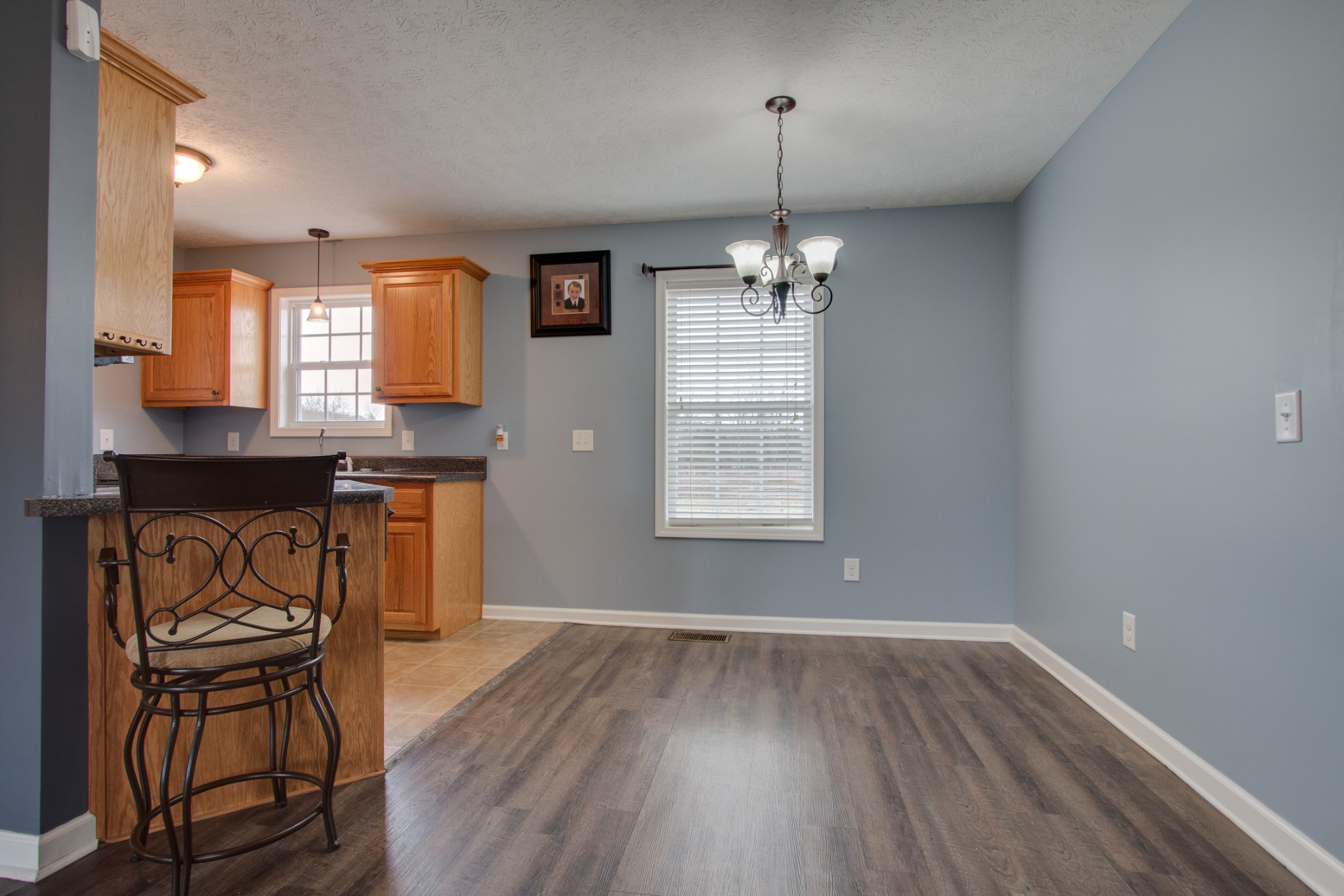 850 North Corinth Road Portland, TN 37148 - Photo 12 of 33 a view of a kitchen with a sink wooden cabinets and outdoor space