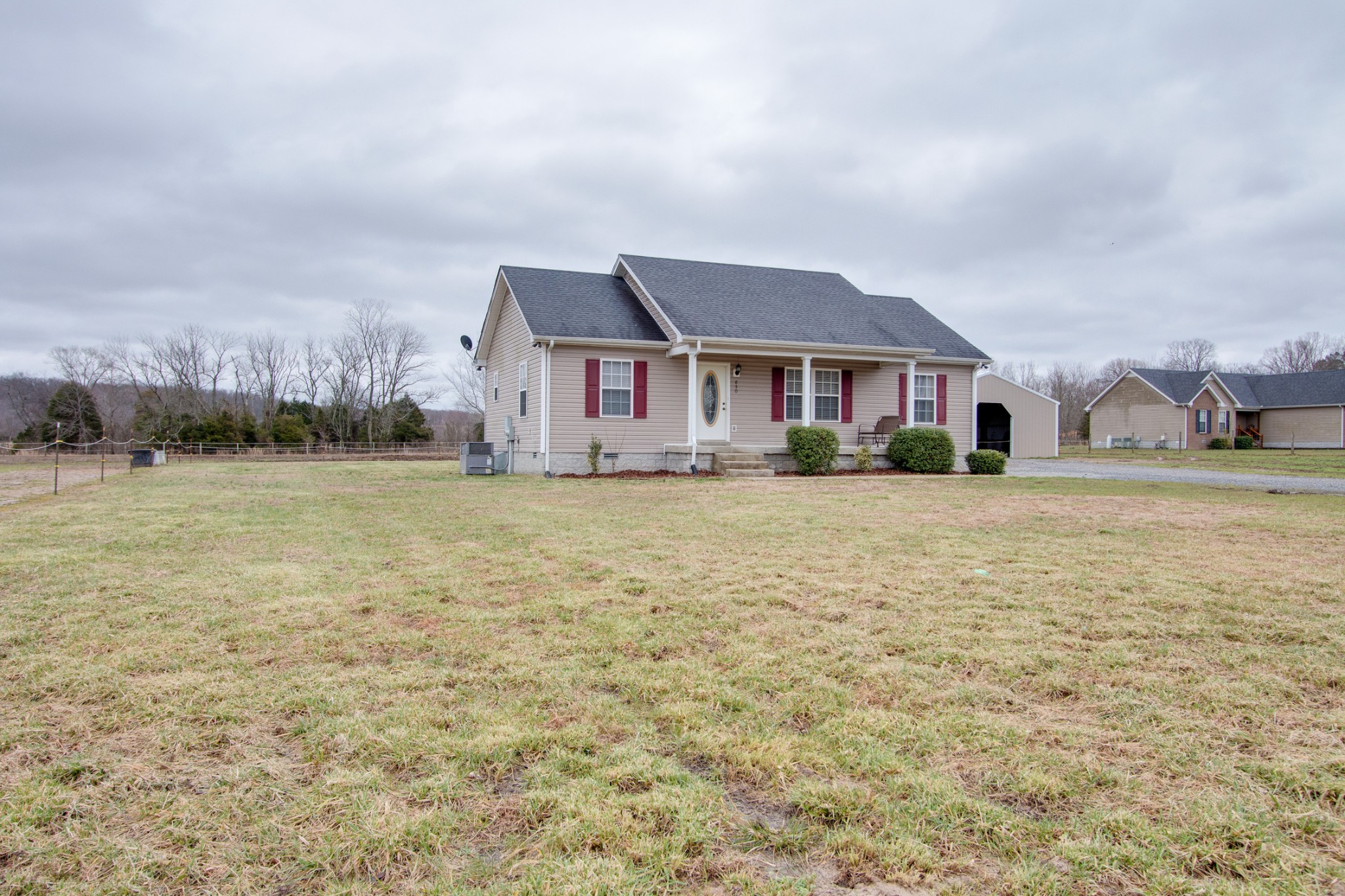 850 North Corinth Road Portland, TN 37148 - Photo 4 of 33 a front view of a house with a yard