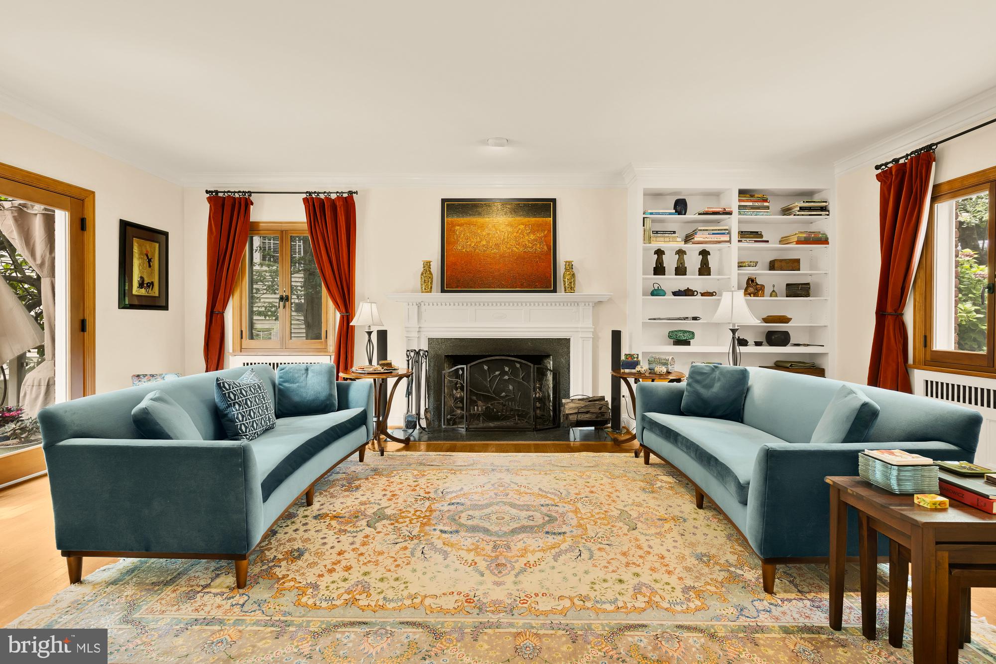 3111 Chain Bridge Road Northwest Washington, DC 20016 - Photo 5 of 71 a living room with furniture and a fireplace