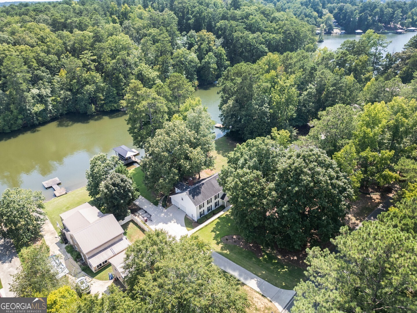2601 Turtle Cove Monticello, GA 31064 - Photo 1 of 85 an aerial view of a residential houses with outdoor space and trees all around
