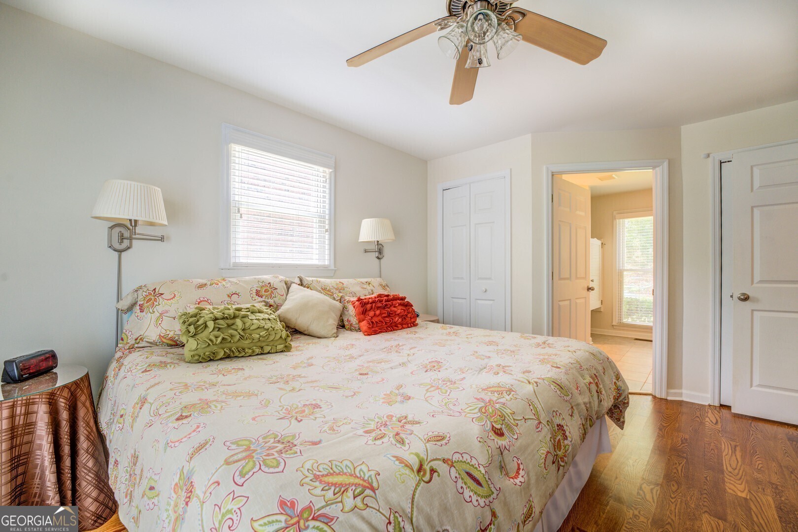 2601 Turtle Cove Monticello, GA 31064 - Photo 22 of 85 a bedroom with a large bed and a chandelier