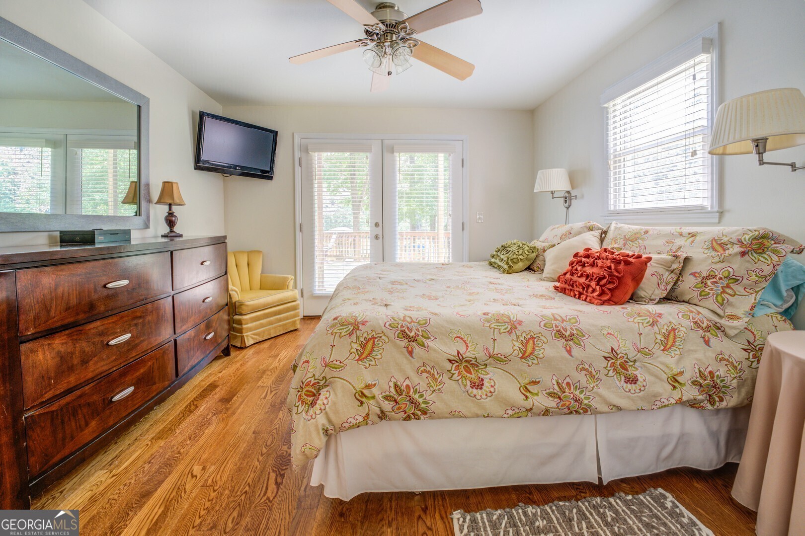 2601 Turtle Cove Monticello, GA 31064 - Photo 24 of 85 a bedroom with a bed and a flat screen television
