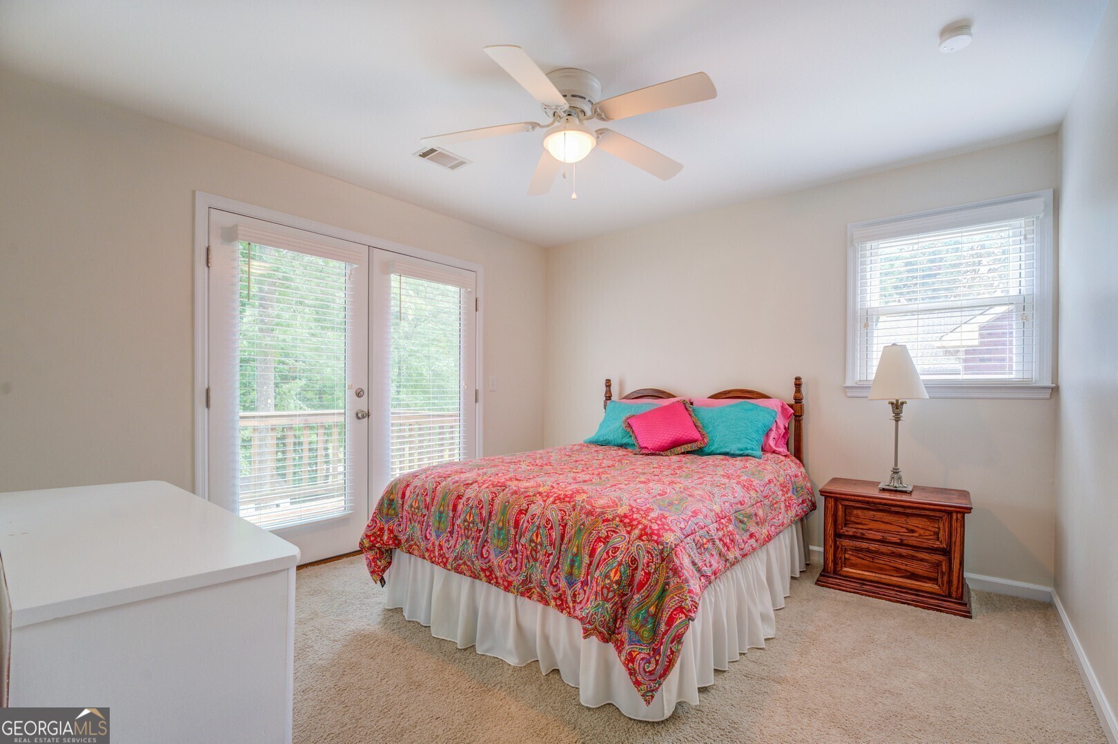 2601 Turtle Cove Monticello, GA 31064 - Photo 33 of 85 a bedroom with a bed and a chandelier