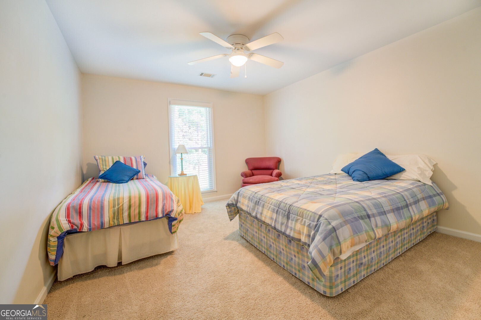 2601 Turtle Cove Monticello, GA 31064 - Photo 35 of 85 a bedroom with a bed and a ceiling fan