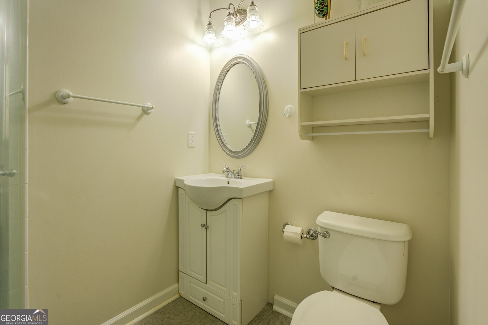 2601 Turtle Cove Monticello, GA 31064 - Photo 45 of 85 a bathroom with a toilet sink and mirror