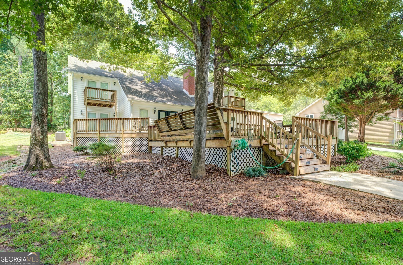 2601 Turtle Cove Monticello, GA 31064 - Photo 56 of 85 a backyard of a house with lots of green space