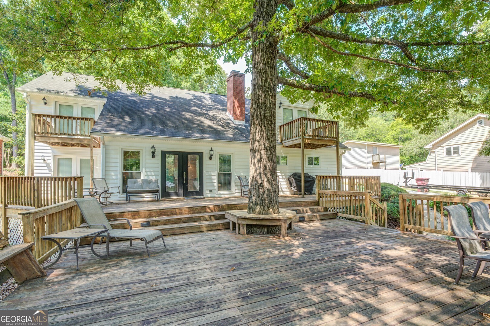 2601 Turtle Cove Monticello, GA 31064 - Photo 66 of 85 a view of house with a chairs and table in a patio