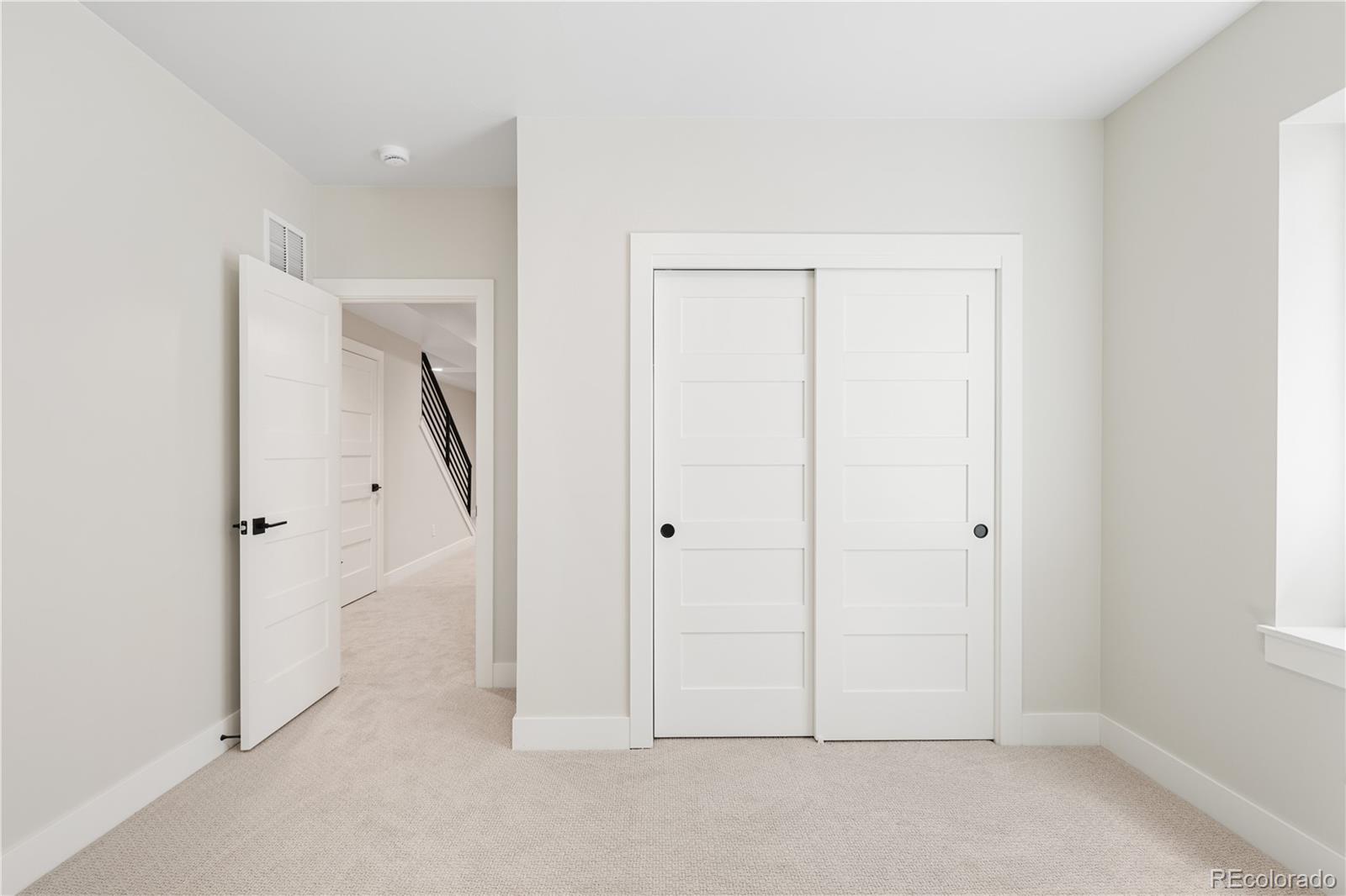 2143 High Street Denver, CO 80205 - Photo 35 of 43 an empty room with windows