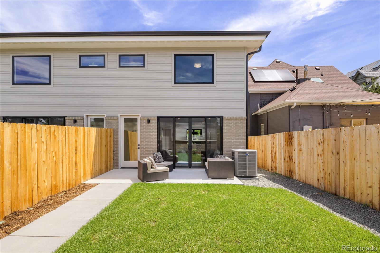 2143 High Street Denver, CO 80205 - Photo 37 of 43 a view of a house with backyard and porch