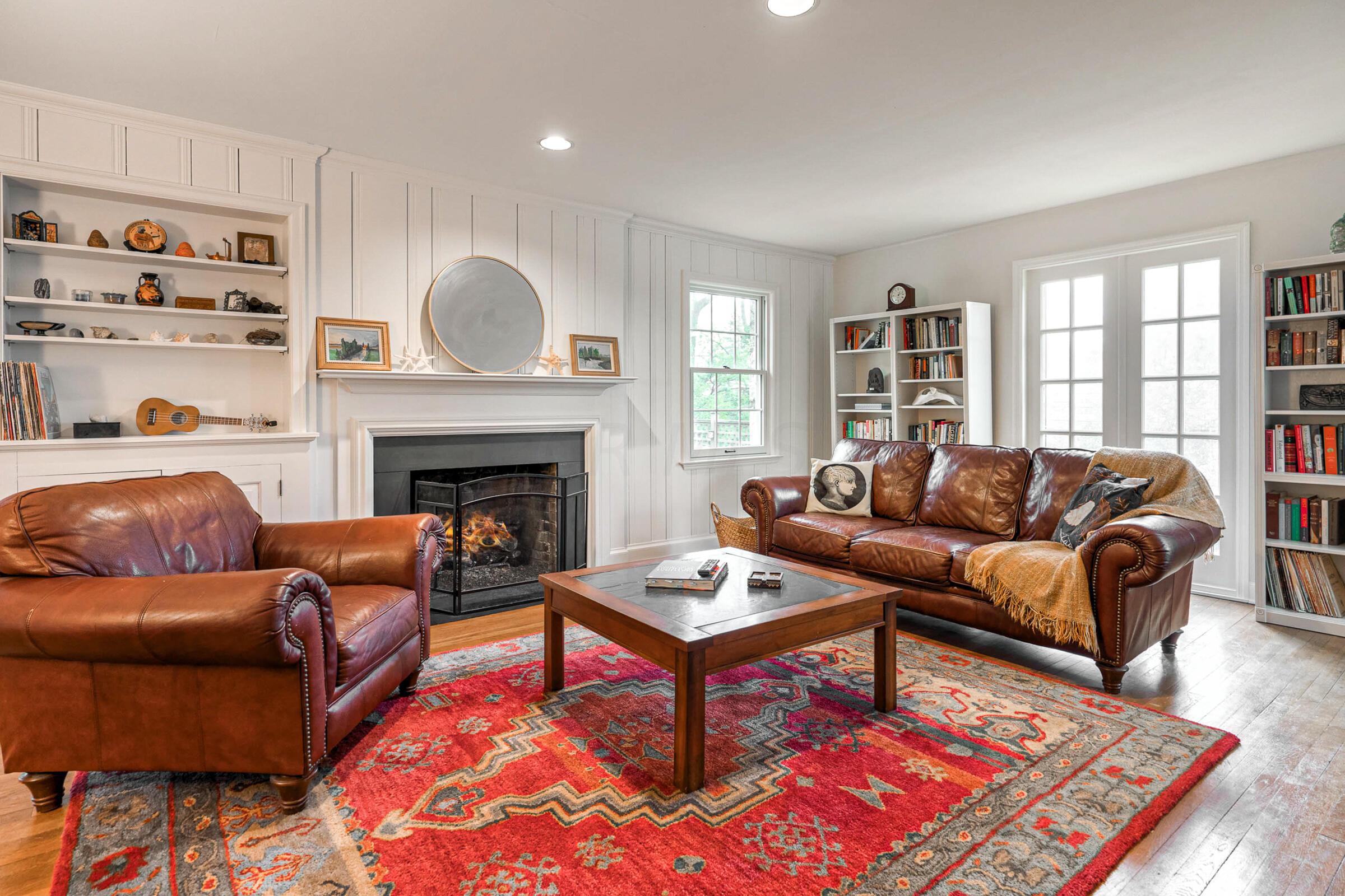 2107 Concord Road Columbus, OH 43212 - Photo 2 of 38 Featuring bookshelves and gas log fireplace