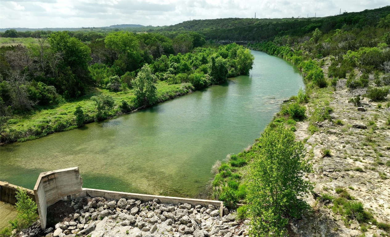 892 Baird Ranch Road Johnson City, TX 78636 - Photo 1 of 22 Miller Creek with dam