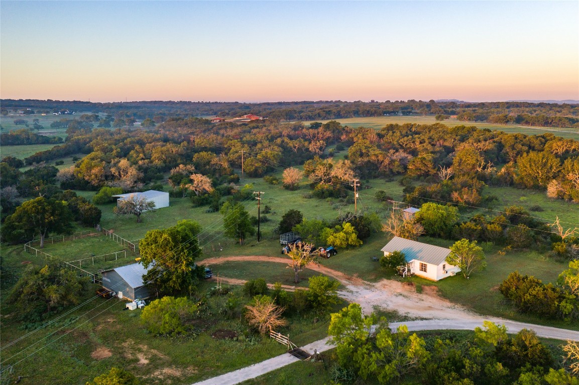 892 Baird Ranch Road Johnson City, TX 78636 - Photo 3 of 22 Birds eye view of guest cabin, barn and outbuildings