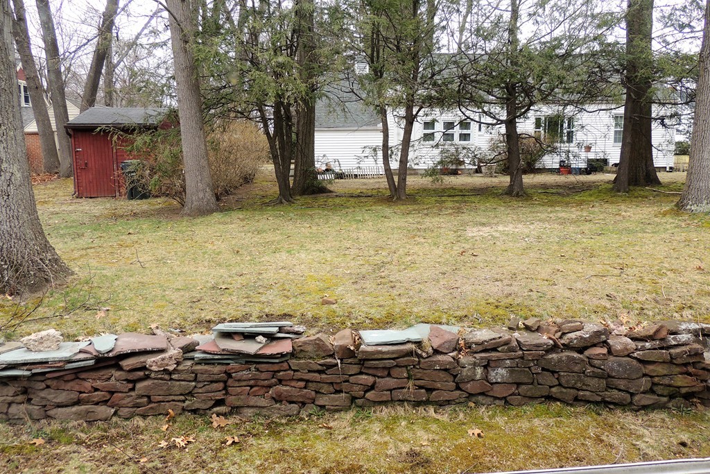 52 Carnavon Circle Springfield, MA 01109 - Photo 14 of 16 a view of a lake with houses