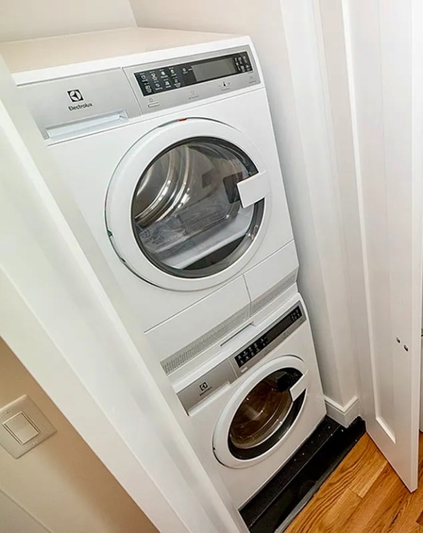 425 Riverside Drive, Unit 7I Manhattan, NY 10025 - Photo 10 of 14 a utility room with dryer and washer