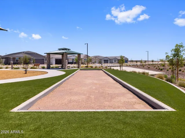 a view of a yard with a patio