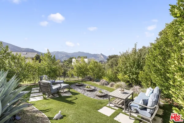 a view of a terrace with sitting area