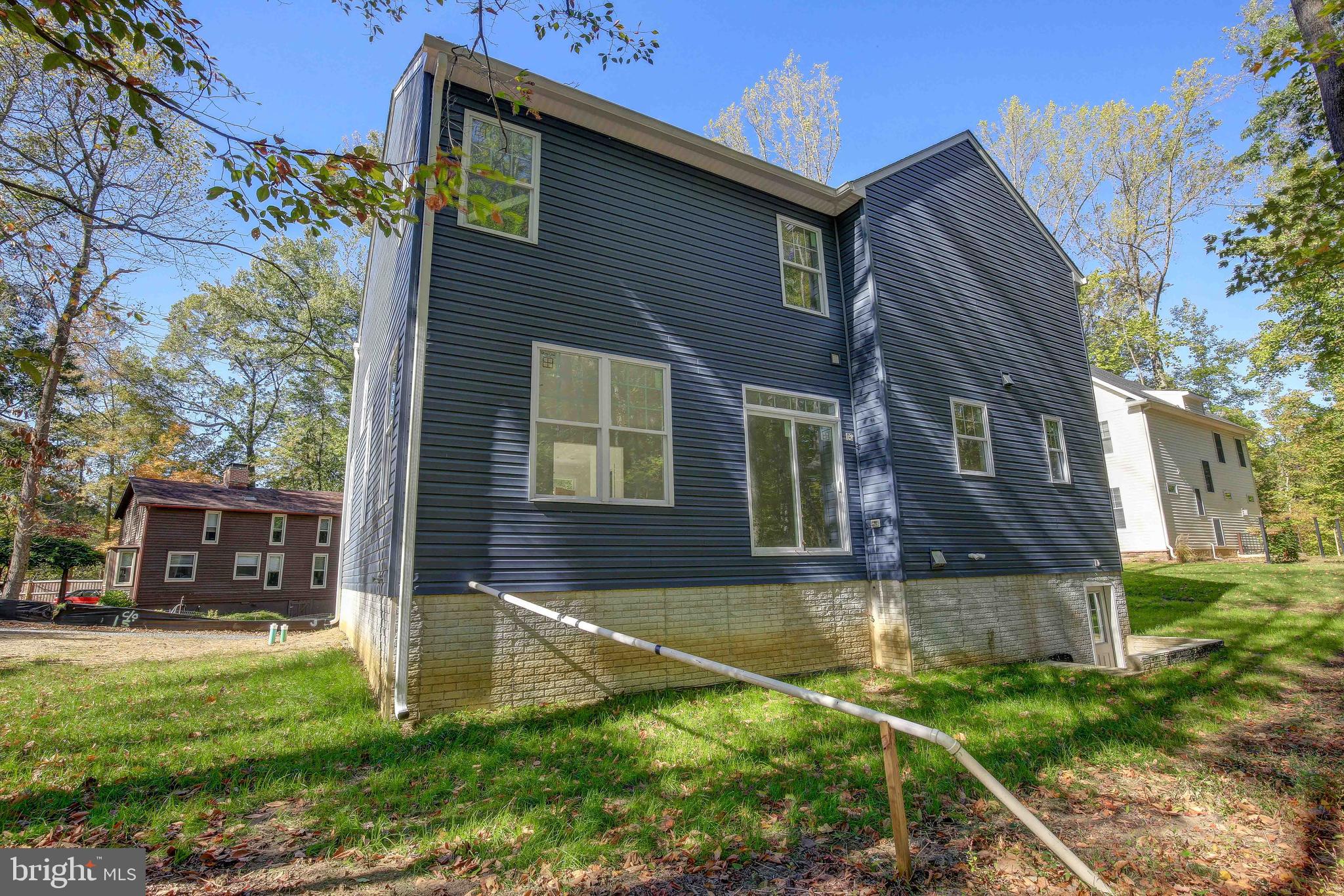 543 Fern Road Riva, MD 21140 - Photo 25 of 51 a view of a house with a yard