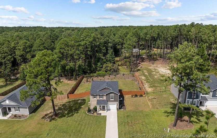 a view of houses with outdoor space and a lake view