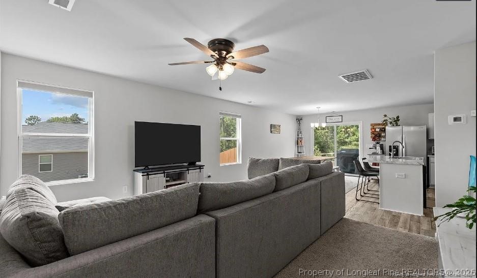 172 Mildred Way Road Aberdeen, NC 28315 - Photo 7 of 7 a living room with furniture and a flat screen tv