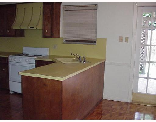 4121 Boros Drive Corpus Christi, TX 78413 - Photo 3 of 3 a kitchen with a sink and cabinets