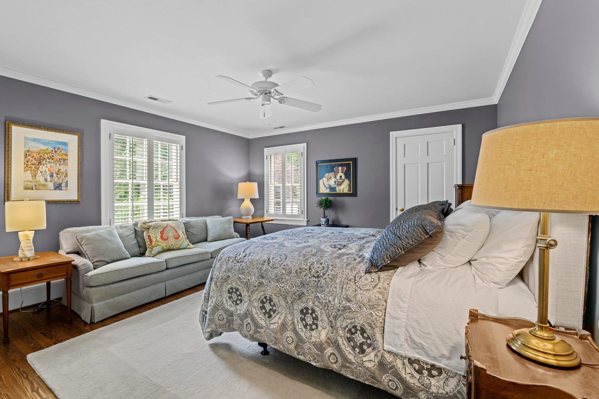 2217 St Marys Street Raleigh, NC 27608 - Photo 31 of 52 Bedroom 4 has crown molding, ceiling fan, and standard closet.