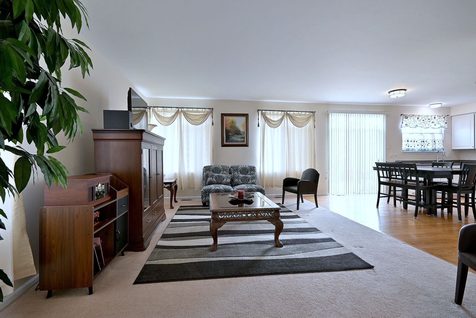 230 Stickley Lane Lake In The Hills, IL 60156 - Photo 23 of 52 a living room with furniture and a fireplace