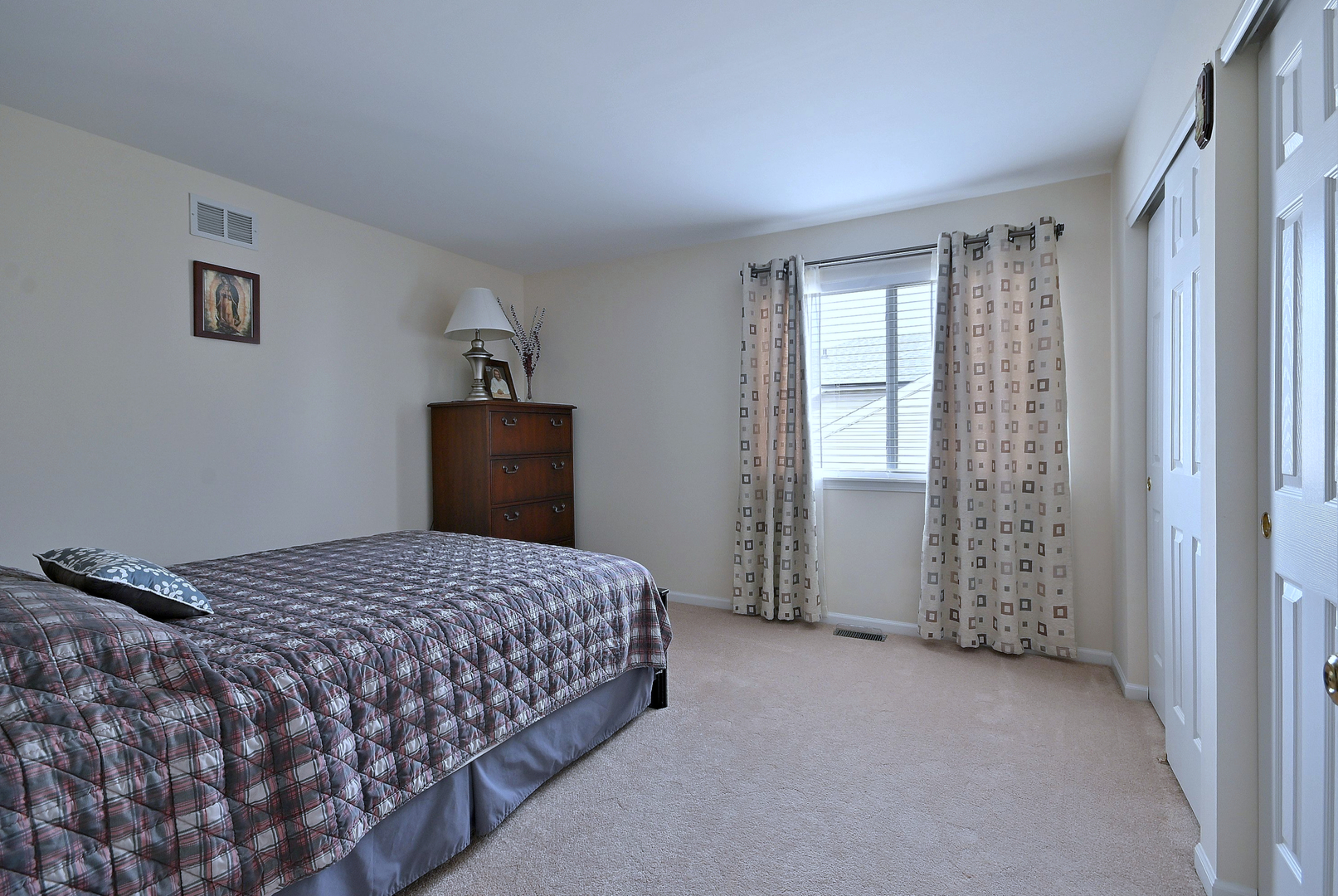 230 Stickley Lane Lake In The Hills, IL 60156 - Photo 30 of 52 a bedroom with a bed and a window