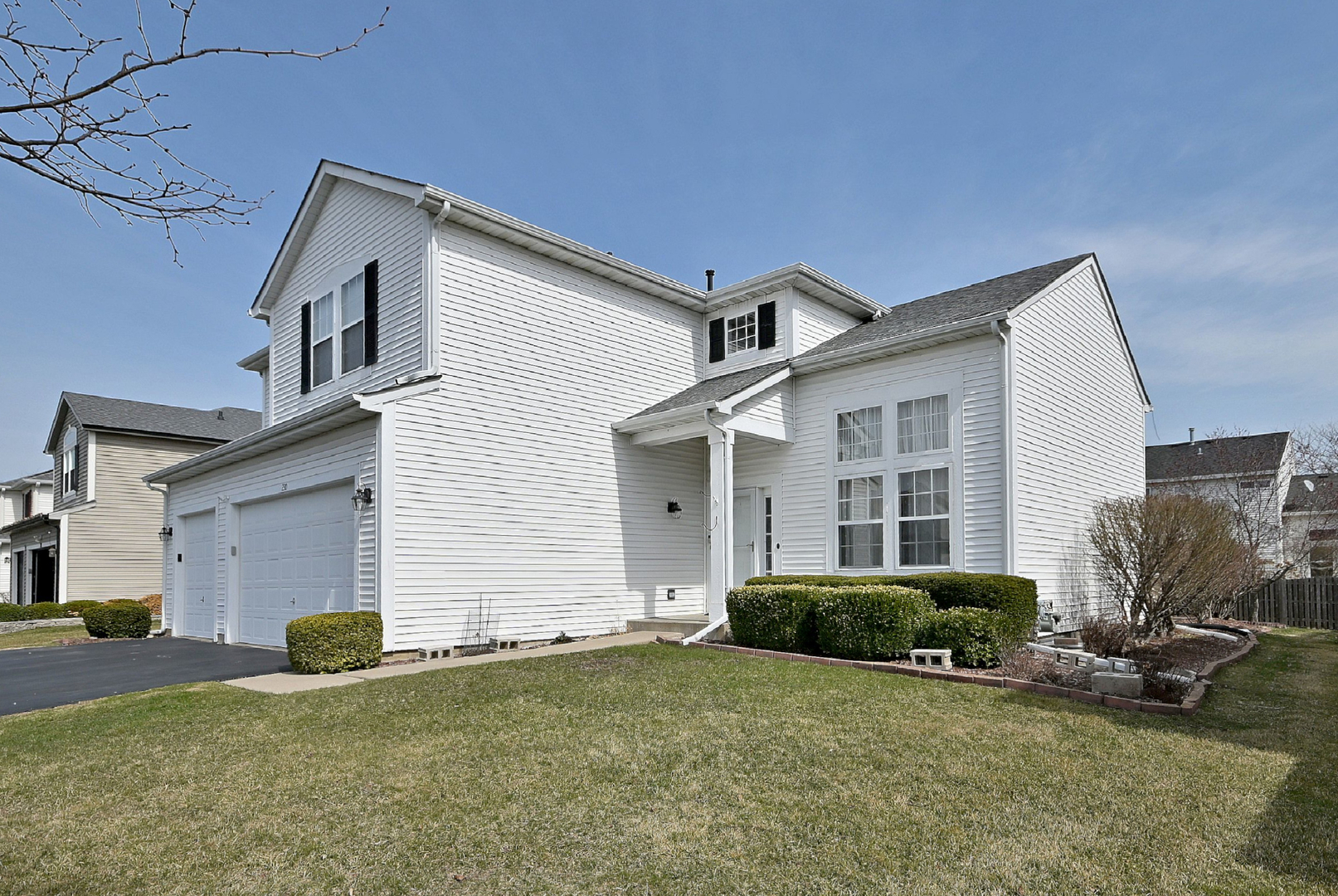 230 Stickley Lane Lake In The Hills, IL 60156 - Photo 3 of 52 a house view with a garden space