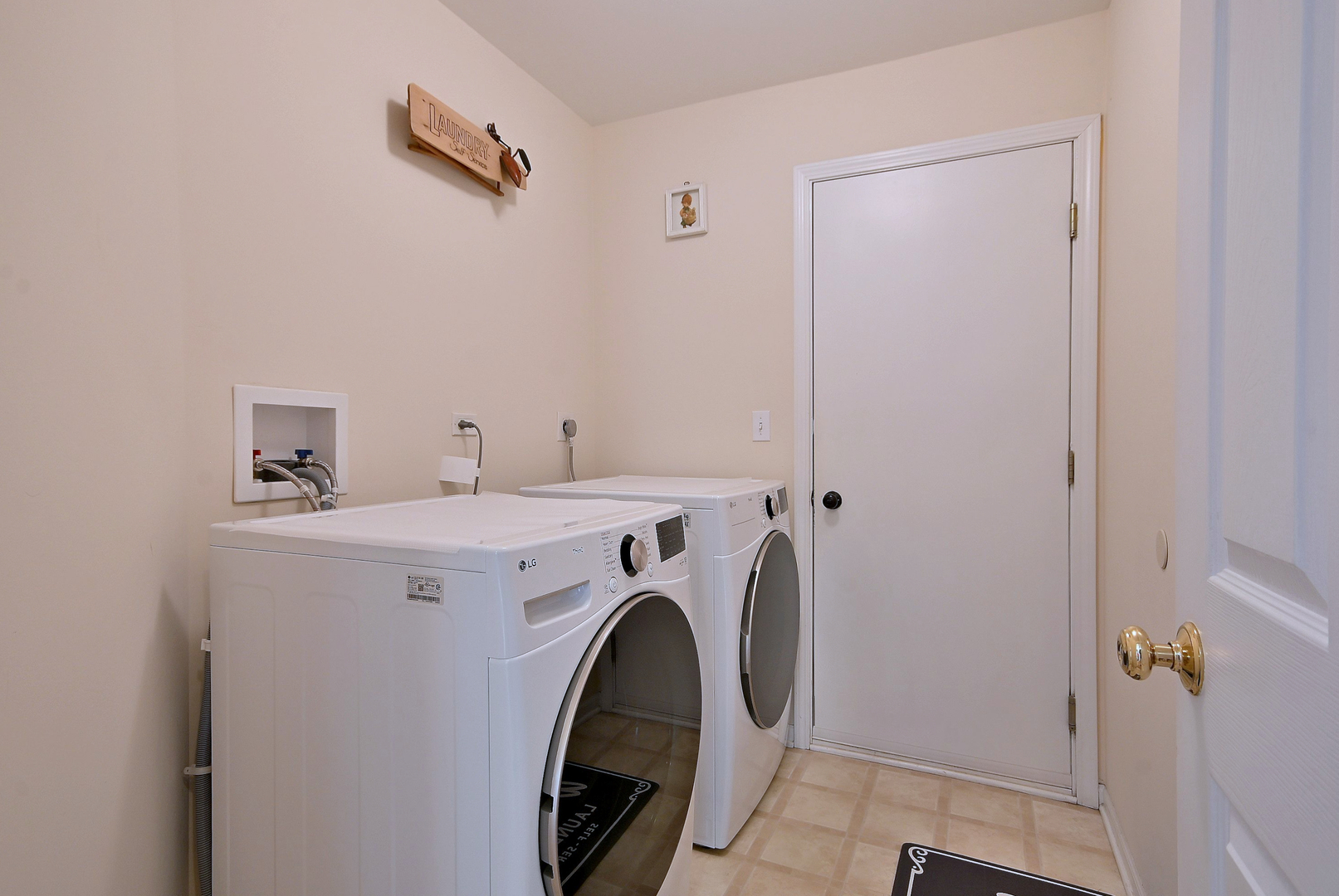 230 Stickley Lane Lake In The Hills, IL 60156 - Photo 38 of 52 a utility room with dryer and washer
