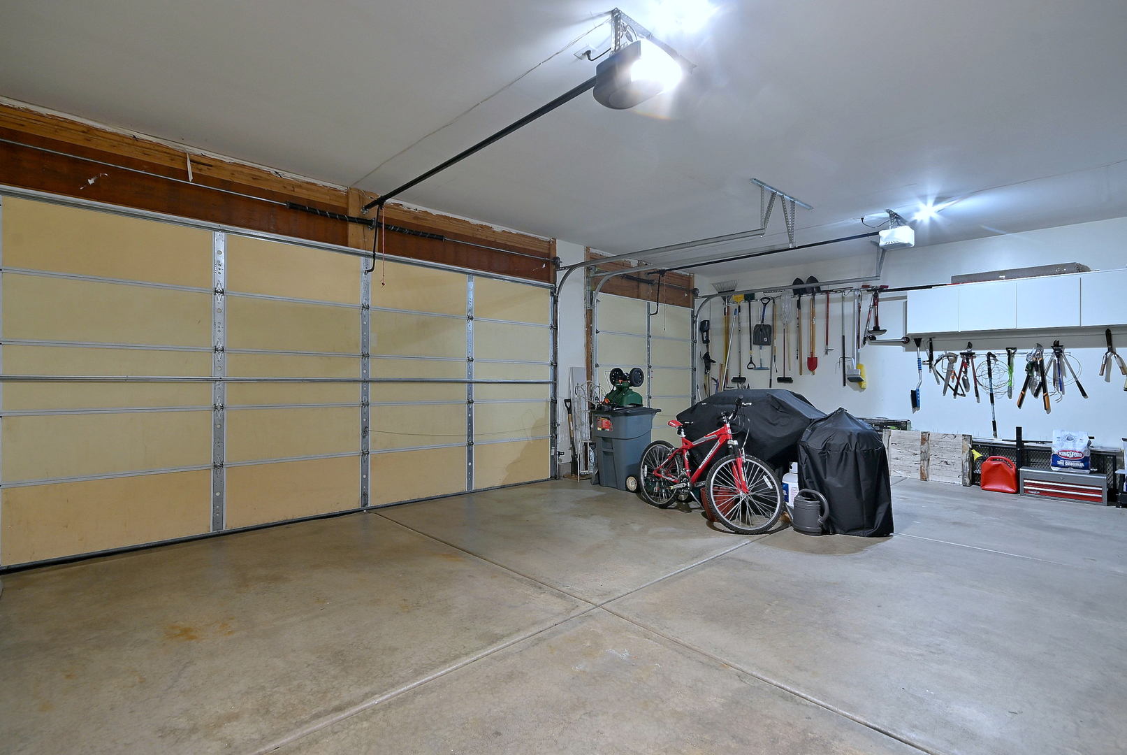 230 Stickley Lane Lake In The Hills, IL 60156 - Photo 39 of 52 a view of a garage with parked cars
