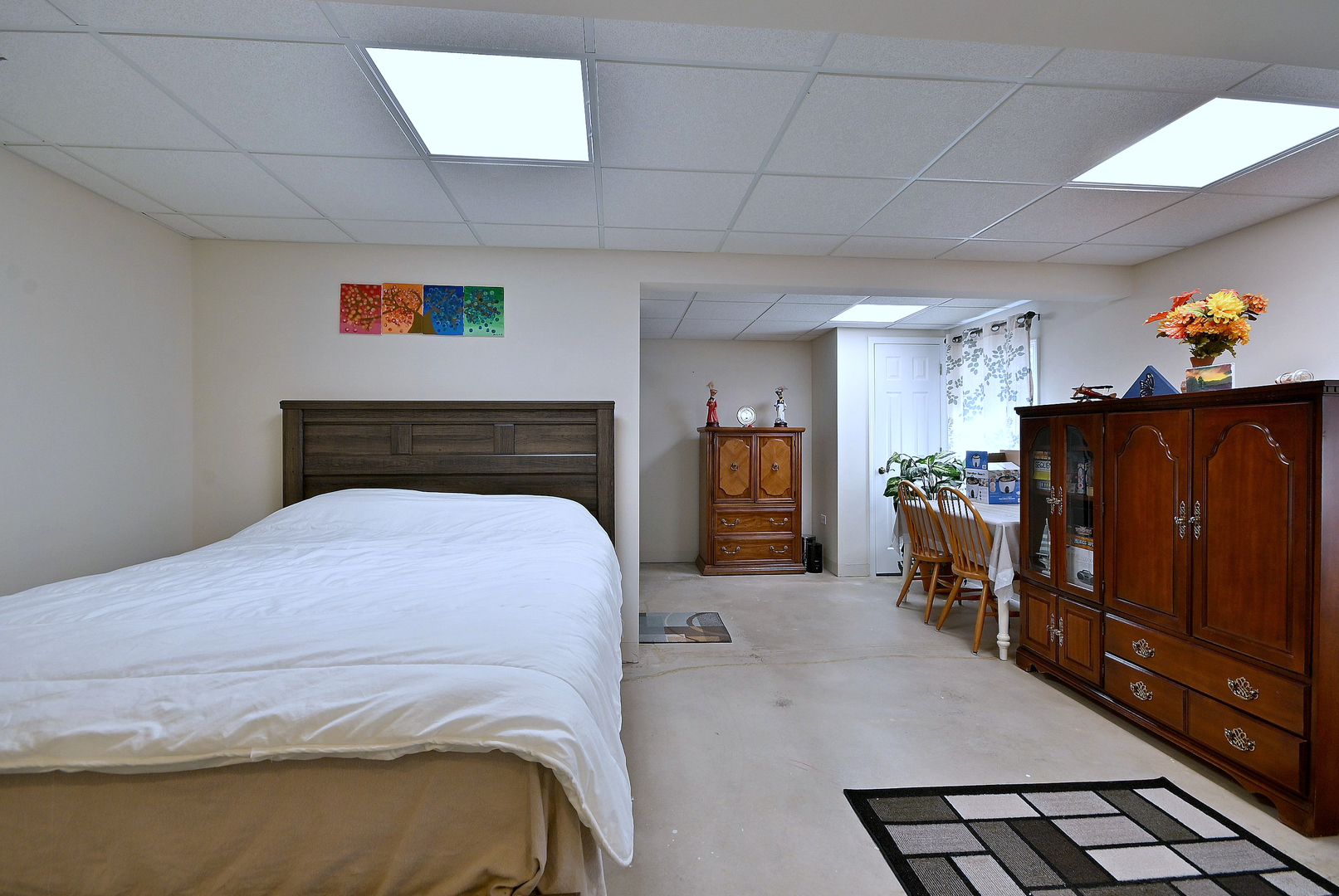 230 Stickley Lane Lake In The Hills, IL 60156 - Photo 41 of 52 a bedroom with bed and wooden furniture