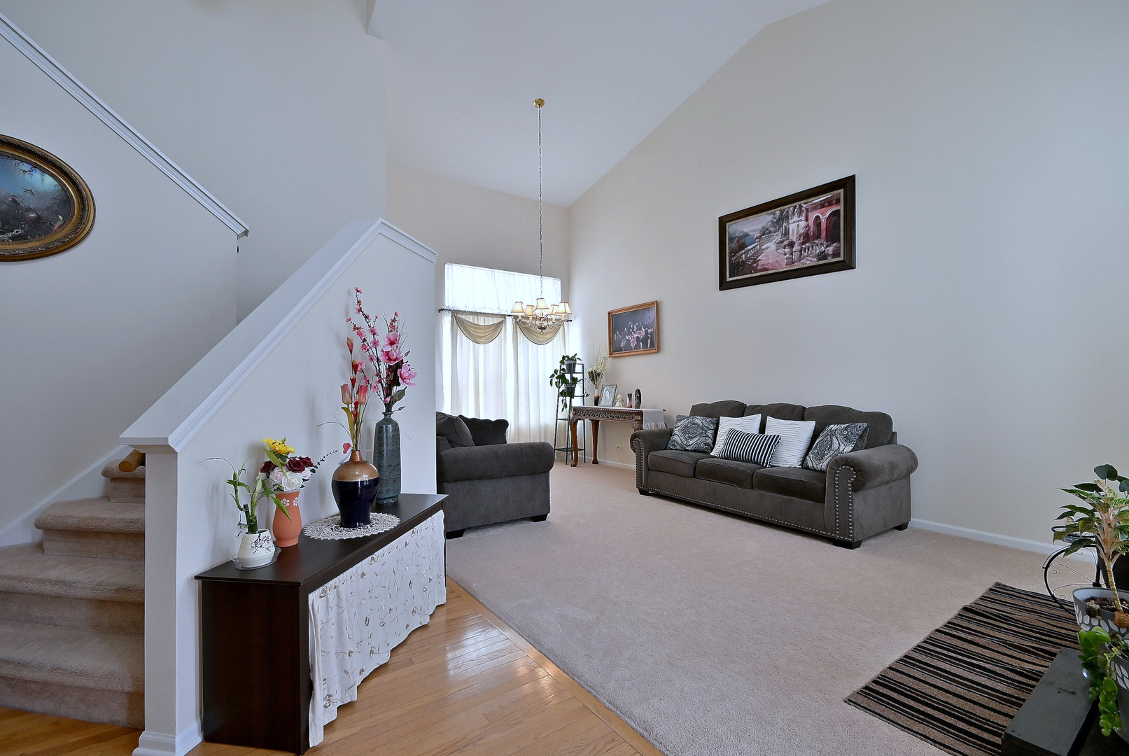 230 Stickley Lane Lake In The Hills, IL 60156 - Photo 6 of 52 a living room with furniture and a flat screen tv
