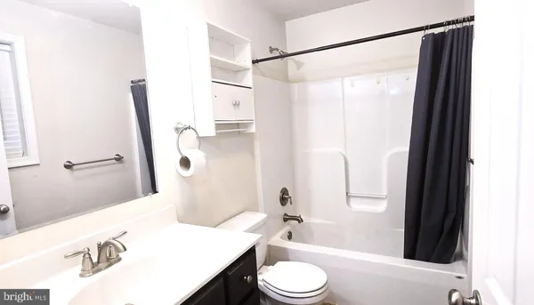 a view of staircase with wooden floor