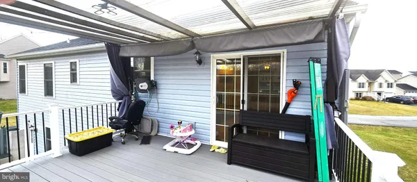 a view of a house with a back yard