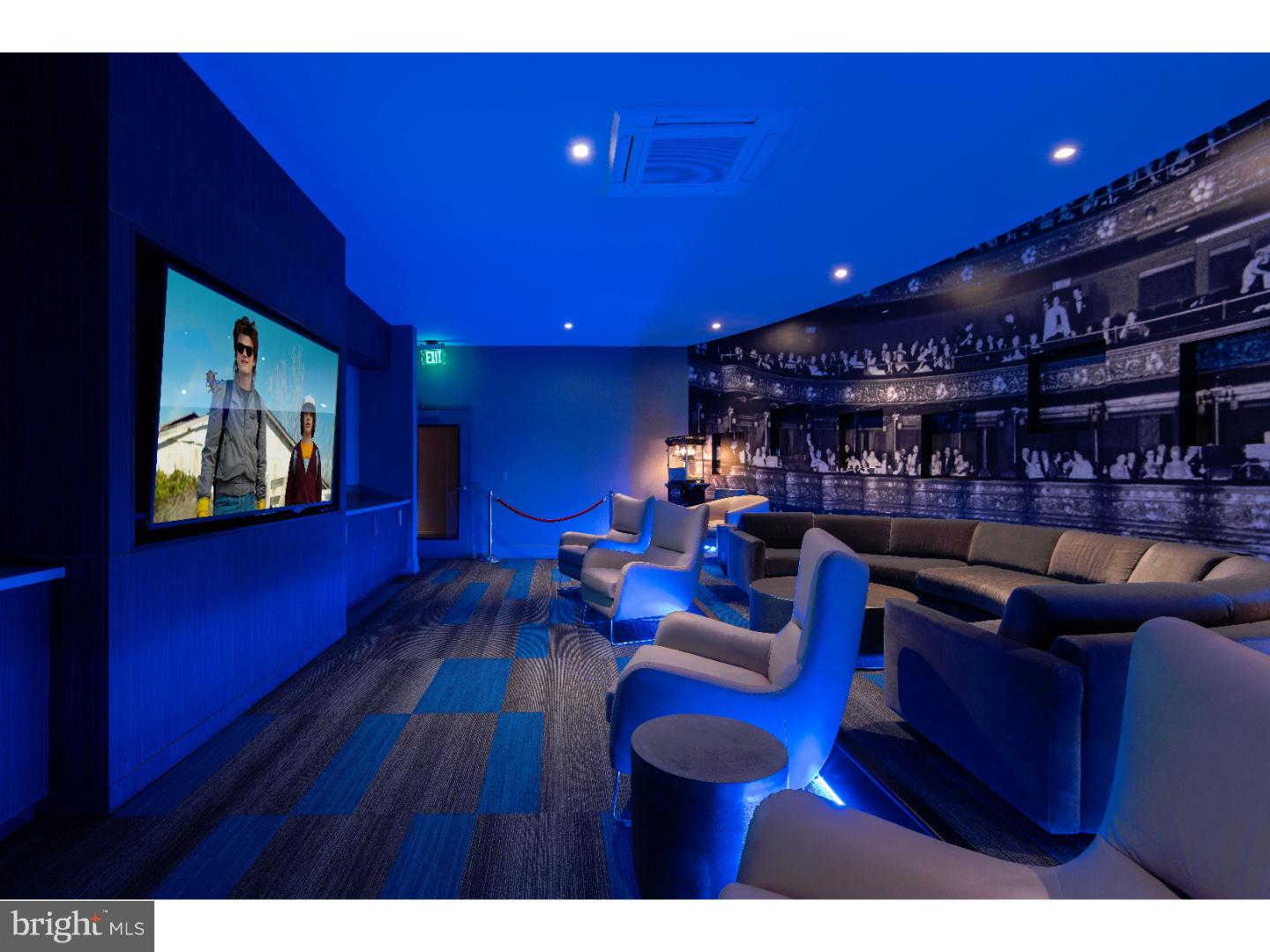 200 North 16th Street, Unit 906 Philadelphia, PA 19102 - Photo 13 of 20 a view of a living room with furniture and a bookshelf