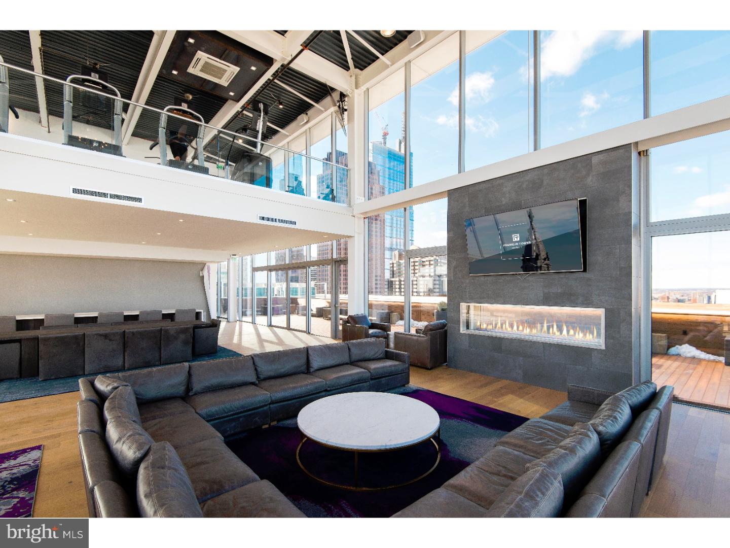 200 North 16th Street, Unit 906 Philadelphia, PA 19102 - Photo 20 of 20 a living room with furniture and a large window