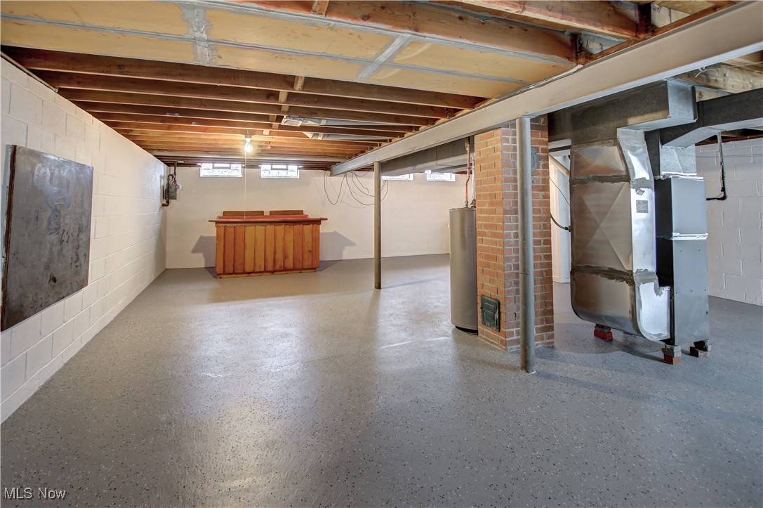 15501 Greendale Road Maple Heights, OH 44137 - Photo 20 of 23 Basement featuring gas water heater and heating unit