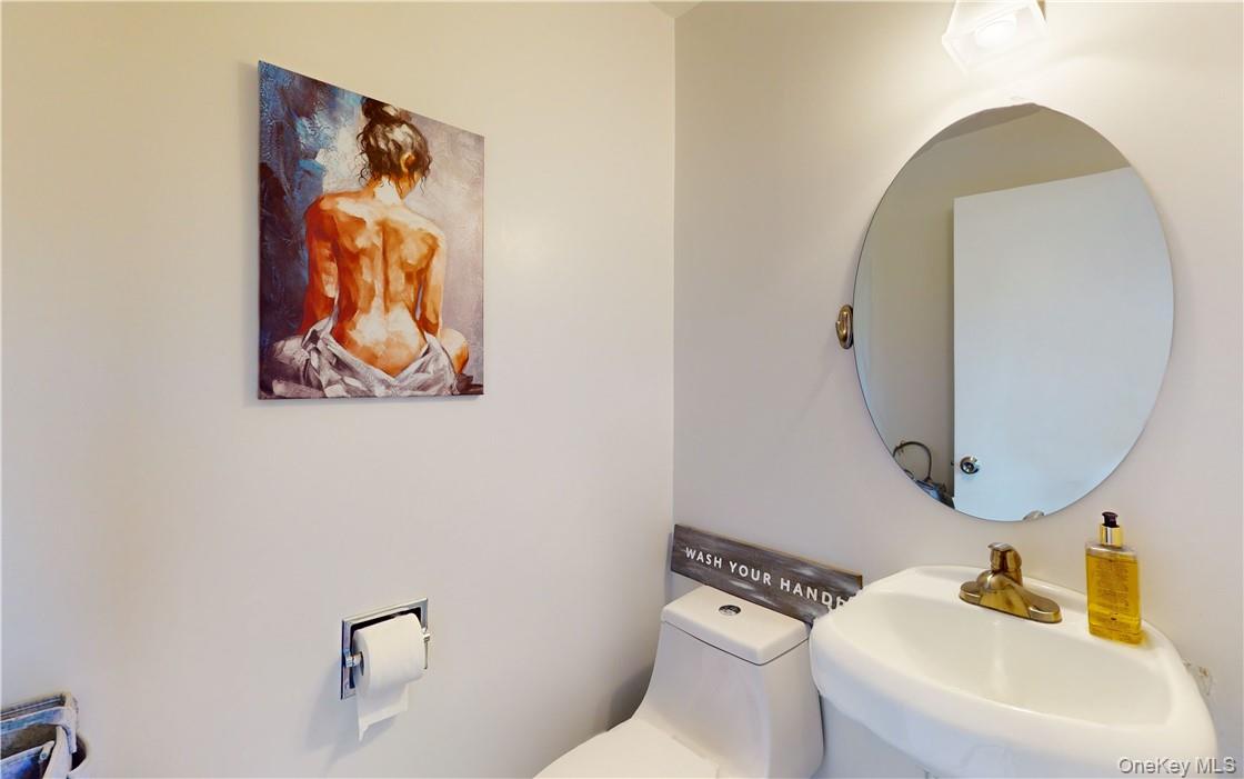 96 Old Pascack Road Pearl River, NY 10965 - Photo 17 of 41 a bathroom with a toilet and a sink
