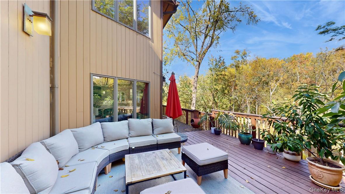 96 Old Pascack Road Pearl River, NY 10965 - Photo 34 of 41 a living room with furniture and a potted plant