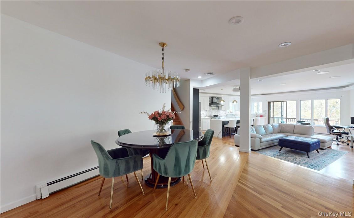 96 Old Pascack Road Pearl River, NY 10965 - Photo 10 of 41 a view of a dining room with furniture window and wooden floor