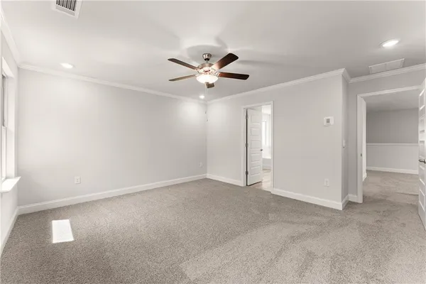 a bathroom with a tub and shower