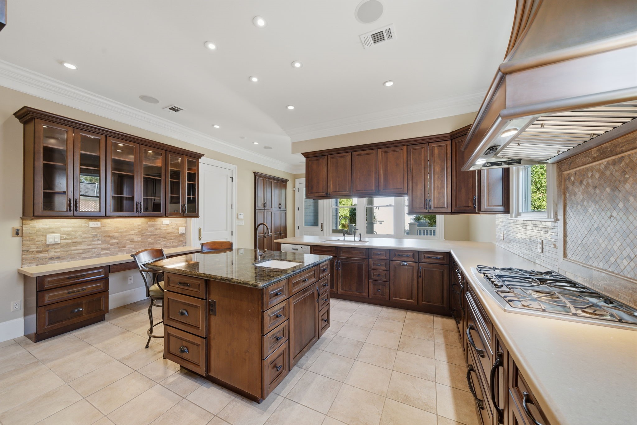 607 East 15th Street Houston, TX 77008 - Photo 14 of 45 a kitchen with stainless steel appliances granite countertop a stove and a sink