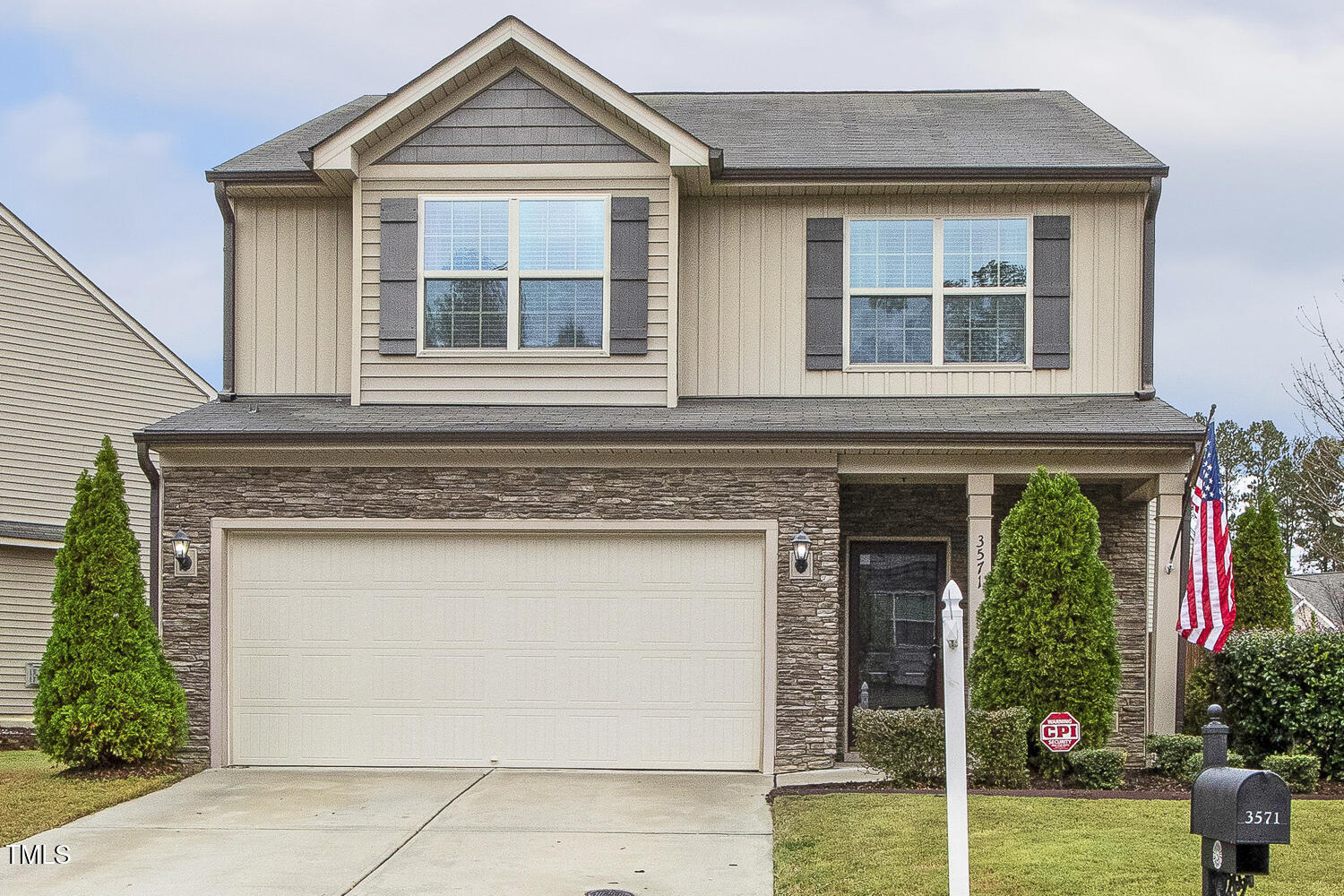 3571 Eastern Branch Road Raleigh, NC 27610 - Photo 1 of 13 a front view of a house with garden