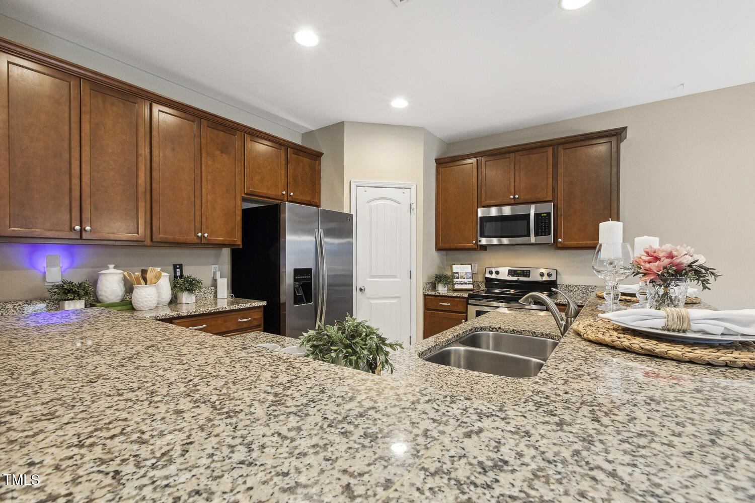 3571 Eastern Branch Road Raleigh, NC 27610 - Photo 3 of 13 a kitchen with granite countertop a sink stove and refrigerator