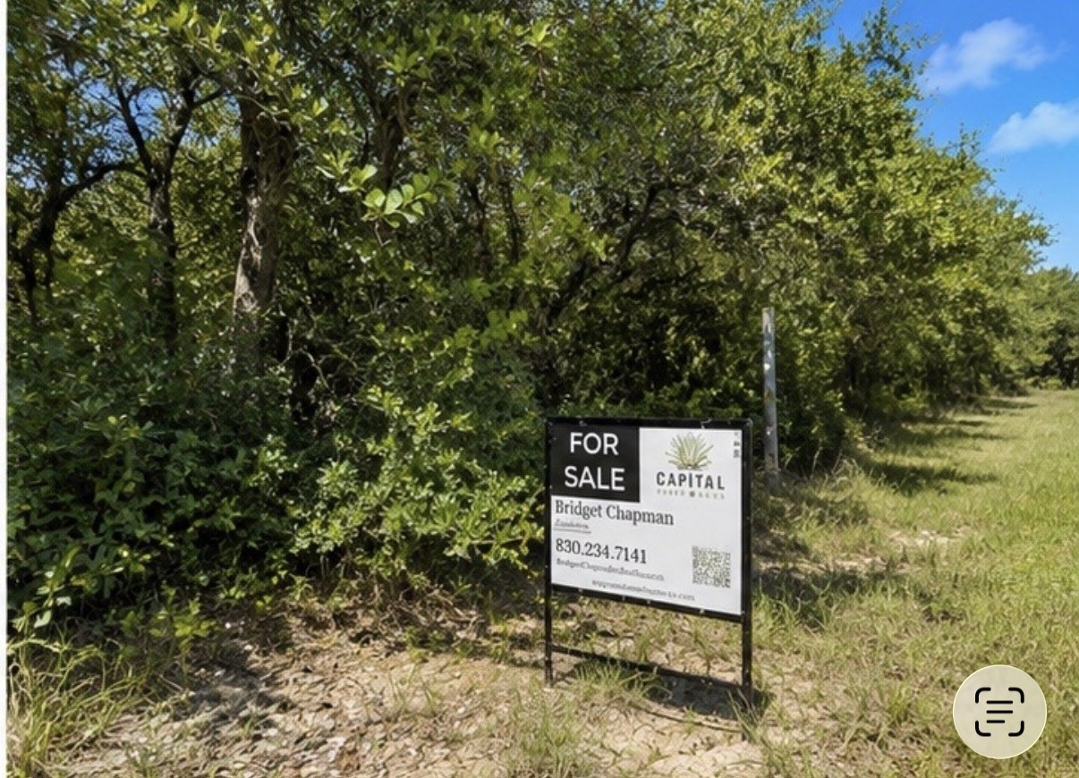 Tbd 6th Street Ingleside, TX 78362 - Photo 5 of 7 a sign board with tall trees