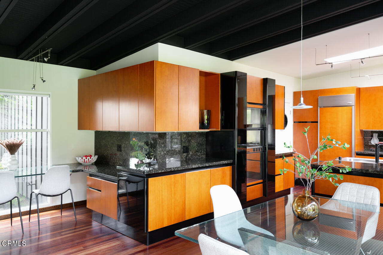 1439 Lida Street Pasadena, CA 91103 - Photo 12 of 39 a living room with patio furniture and a wooden floor