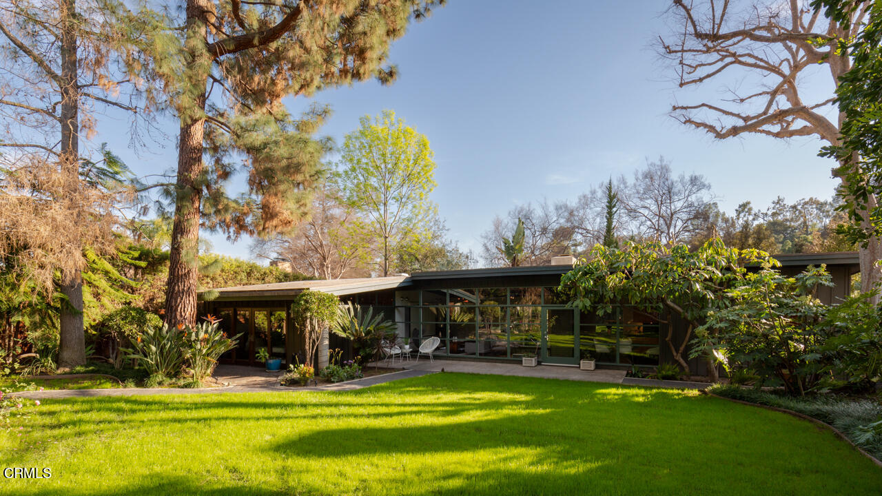 1439 Lida Street Pasadena, CA 91103 - Photo 20 of 39 a view of a building with a swimming pool and sitting area